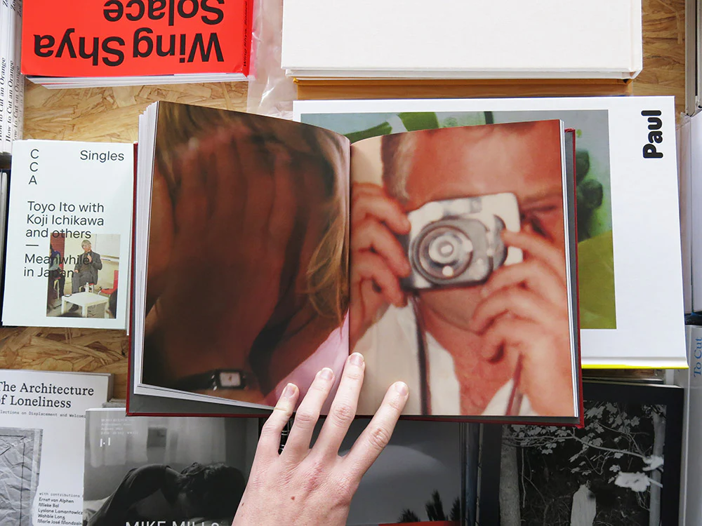 Odette England – Woman Wearing Ring Shields Face from Flash - Image 9